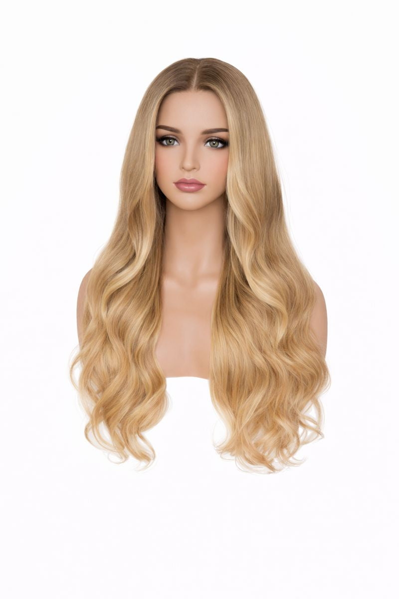 Blonde wig on a mannequin head against a white background