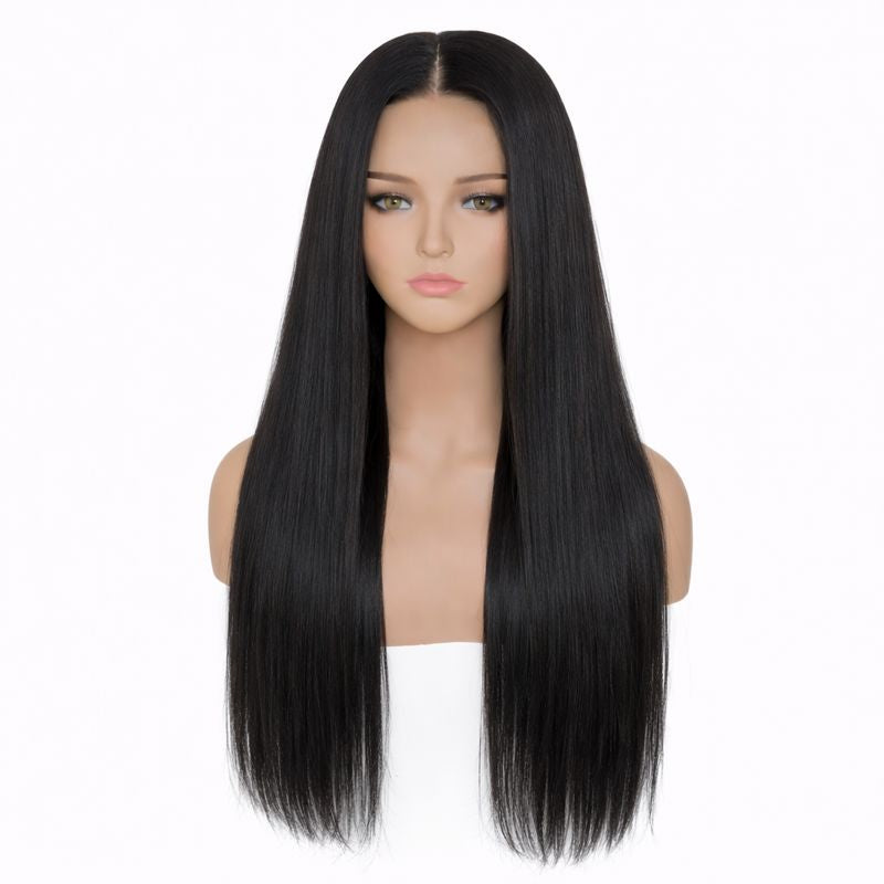 Black wig on a mannequin head against a white background