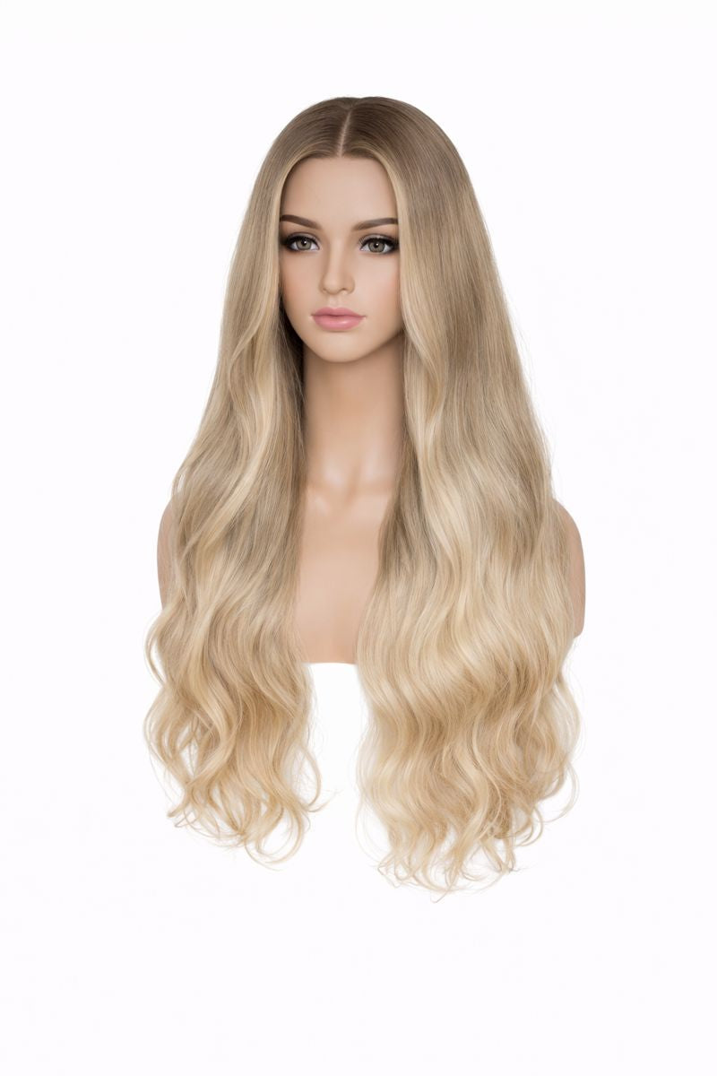 Blonde wig on a mannequin head against a white background