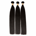 Three bundles of straight black hair extensions on a white background