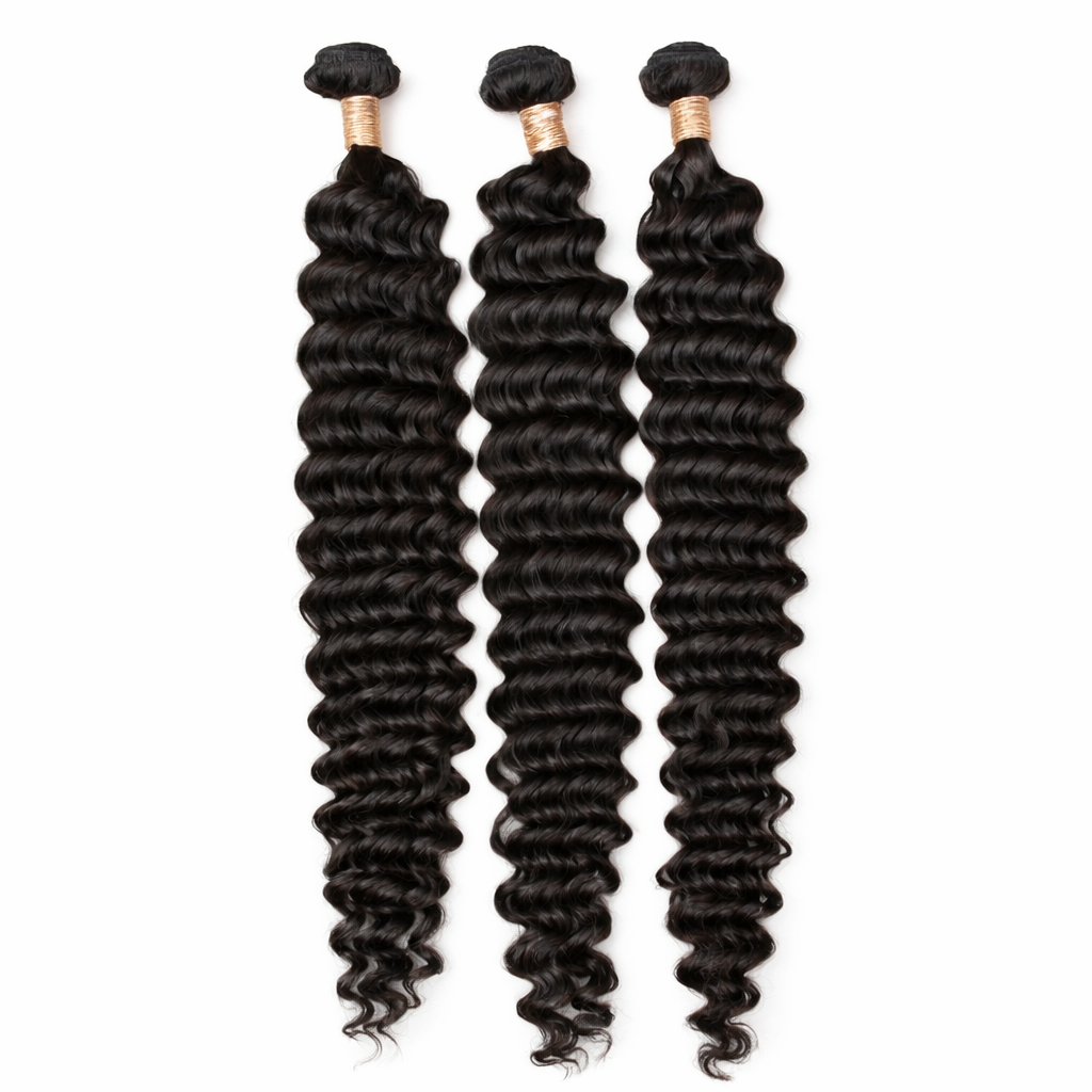 Three bundles of curly black hair extensions on a white background