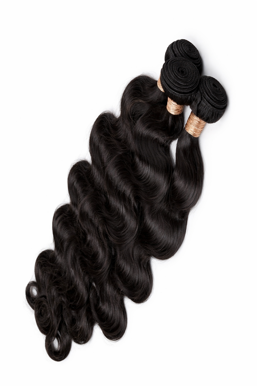 Three bundles of black hair extensions on a white background